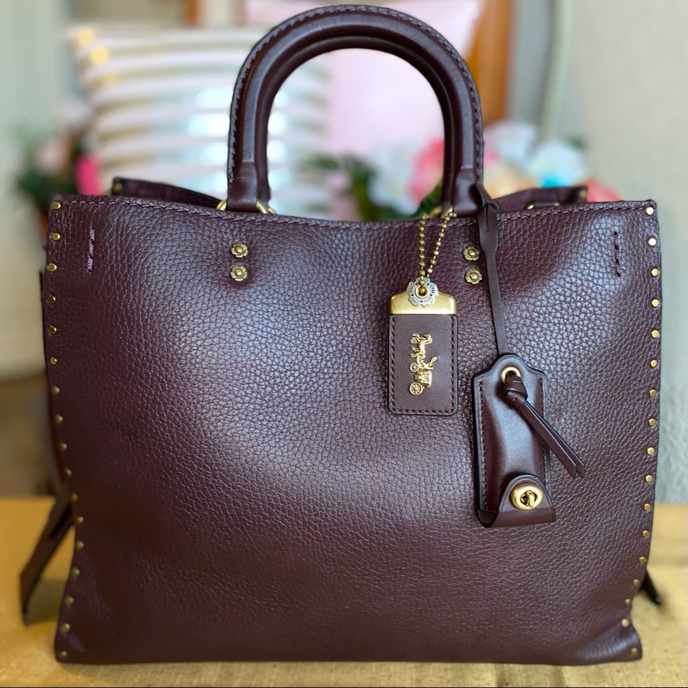 NWOT Coach Rogue with Rivets Oxblood 30/31